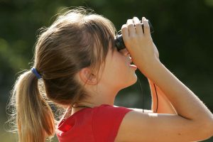 little girl birdwatching